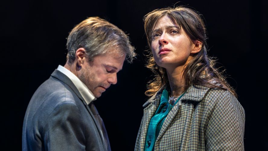 Agnes O'Casey plays Liz Gold. She is in the forefront of the picture looking sad with one tear rolling down her cheek. Rory Keenan plays Alex Leamas and is looking down in the background