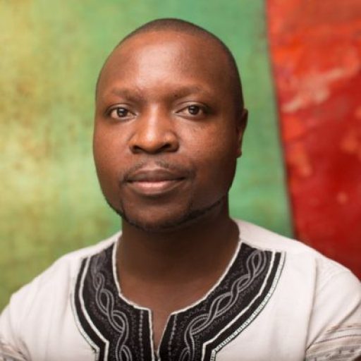 William Kamkwamba in front of a green and red background