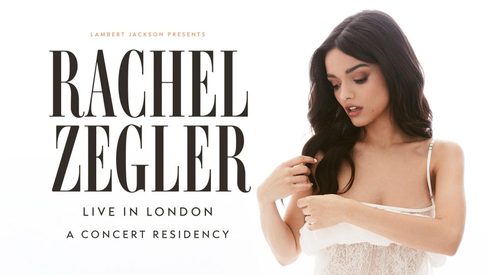 The title 'Rachel Zegler Live In London' is on a white background. Rachel is to the right of the text playing with her hair, wearing white.